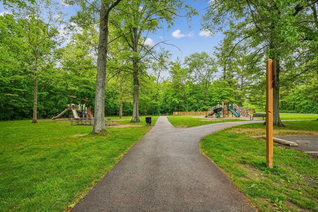 651 Dovalon Pl, Galloway, OH 43119 - view of property's community featuring a playground and a yard