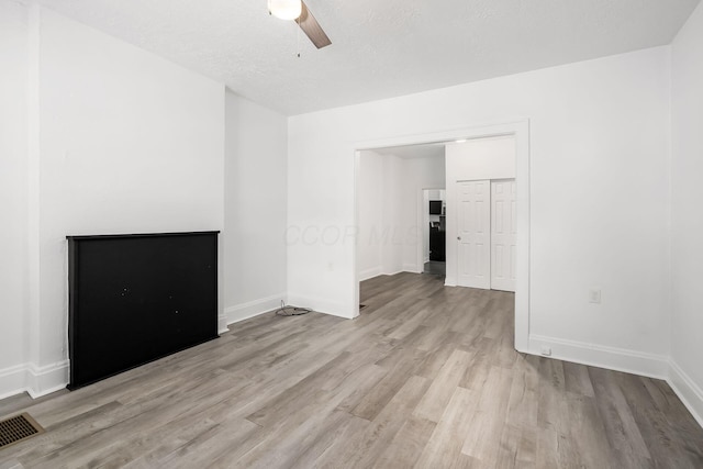 848-850 Carpenter St, Columbus, OH 43206 - unfurnished room featuring light wood-style flooring, a ceiling fan, and baseboards