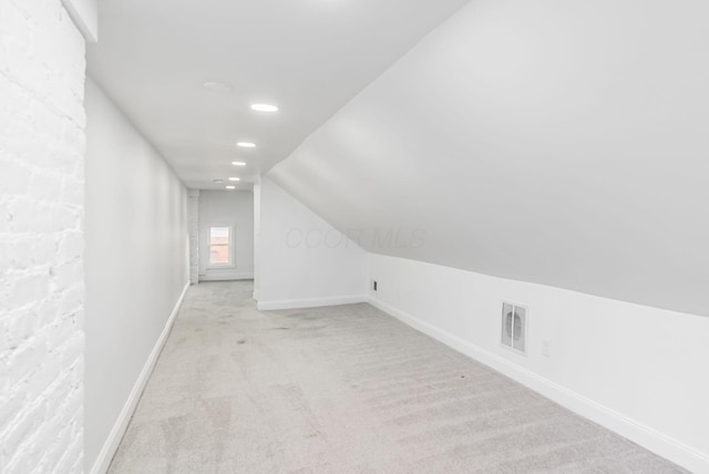 848-850 Carpenter St, Columbus, OH 43206 - bonus room with light colored carpet, vaulted ceiling, recessed lighting, and baseboards