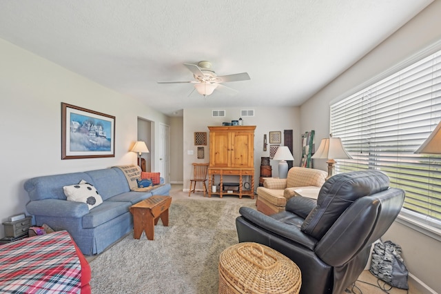 15301 Gandy Eddy Rd, Marysville, OH 43040 - living room featuring carpet floors, ceiling fan, and baseboards