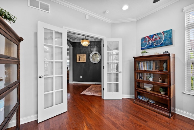 5568 Lexington Dr, Hilliard, OH 43026 - entryway with french doors, crown molding, baseboards, and wood finished floors