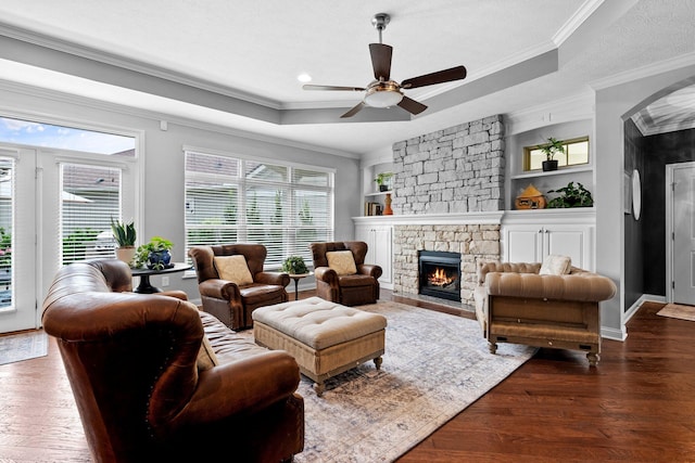 5568 Lexington Dr, Hilliard, OH 43026 - living room with a tray ceiling, wood finished floors, healthy amount of natural light, ornamental molding, and recessed lighting