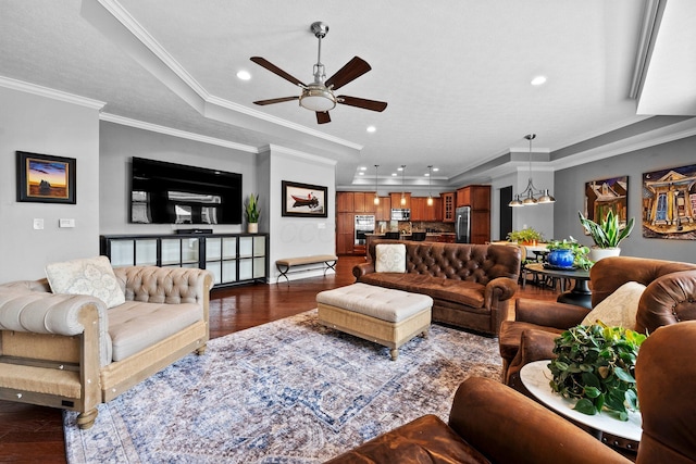 5568 Lexington Dr, Hilliard, OH 43026 - living room with a raised ceiling, ceiling fan, recessed lighting, crown molding, and dark wood finished floors