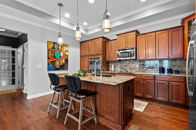 5568 Lexington Dr, Hilliard, OH 43026 - kitchen with appliances with stainless steel finishes, dark wood-style floors, decorative backsplash, recessed lighting, and ornamental molding