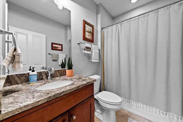 5568 Lexington Dr, Hilliard, OH 43026 - full bathroom with tile patterned floors, toilet, vanity, recessed lighting, and a shower with curtain