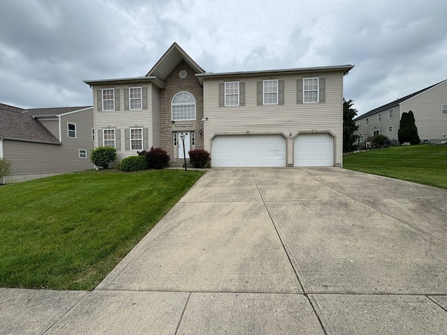 310 Abbey Ave, Lithopolis, OH 43136 - view of front of property with driveway, a garage, and a front lawn