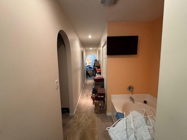 310 Abbey Ave, Lithopolis, OH 43136 - hallway with arched walkways, carpet floors, baseboards, and recessed lighting