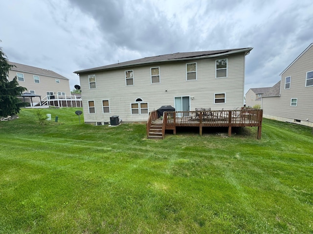 310 Abbey Ave, Lithopolis, OH 43136 - back of property with a wooden deck and a lawn