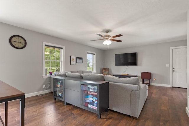 29938 Wolfe Rd, Circleville, OH 43113 - living room with ceiling fan, dark wood-style floors, and baseboards
