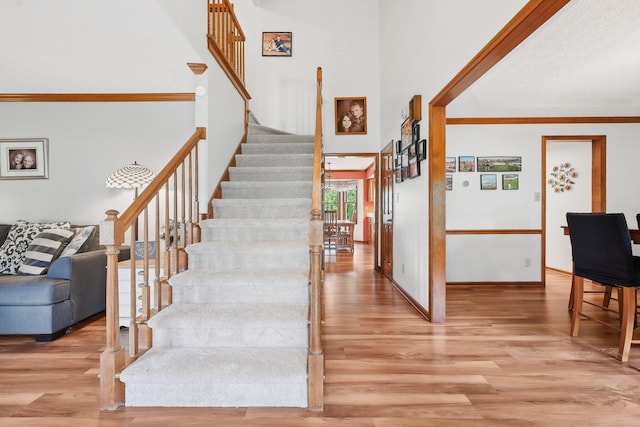 8628 N Spring Ct, Pickerington, OH 43147 - stairway featuring wood finished floors and baseboards