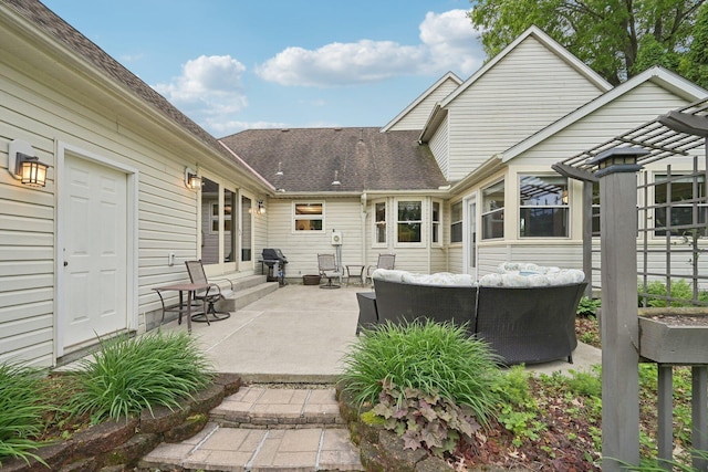 8628 N Spring Ct, Pickerington, OH 43147 - rear view of property with a patio and roof with shingles