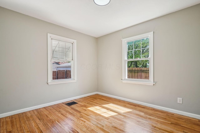 1118 E 26th Ave, Columbus, OH 43211 - unfurnished room with baseboards and wood finished floors