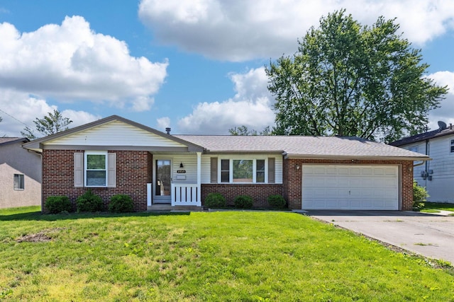 3350 Cameron St, Grove City, OH 43123 - single story home featuring driveway, brick siding, a garage, and a front lawn