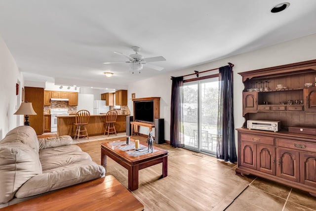 3350 Cameron St, Grove City, OH 43123 - living room with a ceiling fan and light tile patterned flooring