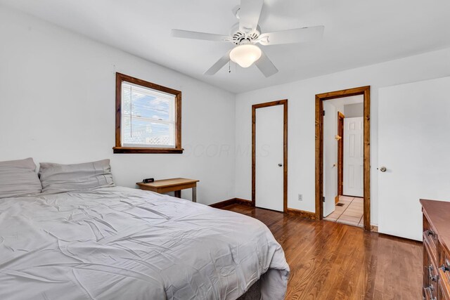 3350 Cameron St, Grove City, OH 43123 - bedroom featuring wood finished floors, ceiling fan, and baseboards