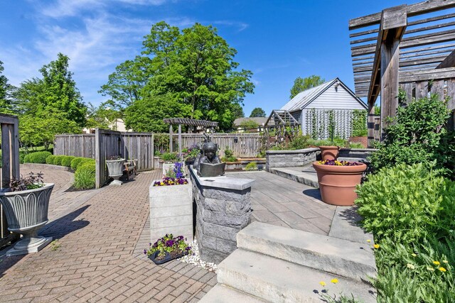 3350 Cameron St, Grove City, OH 43123 - fenced backyard featuring a pergola and a patio