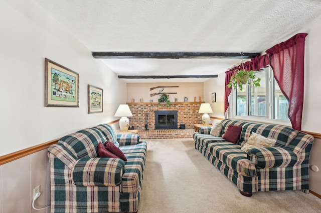 8177 Maugham Dr, Reynoldsburg, OH 43068 - carpeted living area with a textured ceiling, a brick fireplace, beam ceiling, and a wainscoted wall