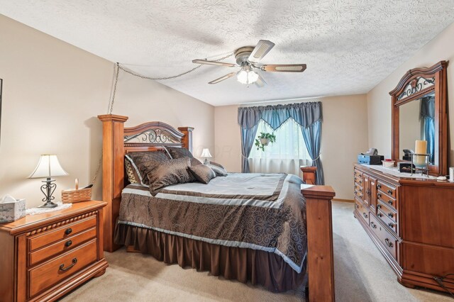 8177 Maugham Dr, Reynoldsburg, OH 43068 - bedroom with light carpet, a textured ceiling, and ceiling fan