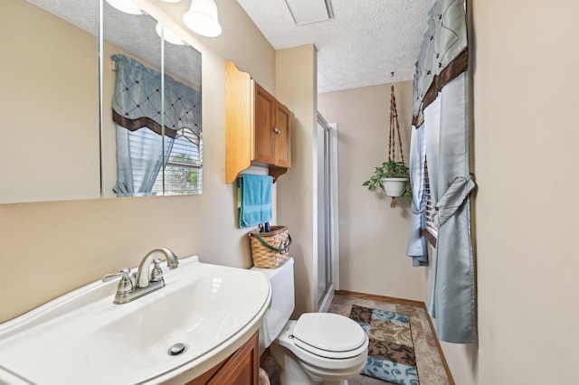 8177 Maugham Dr, Reynoldsburg, OH 43068 - full bath with a stall shower, a textured ceiling, vanity, and toilet