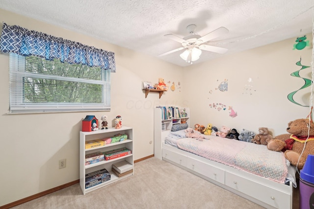 8177 Maugham Dr, Reynoldsburg, OH 43068 - bedroom featuring carpet floors, baseboards, a textured ceiling, and a ceiling fan