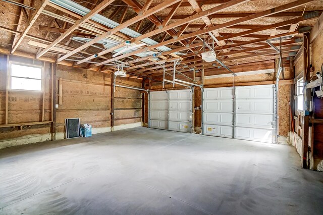 12323 Ringer Ln, Leesburg, OH 45135 - garage featuring a garage door opener