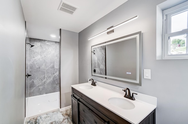 12323 Ringer Ln, Leesburg, OH 45135 - full bathroom with walk in shower, double vanity, and baseboards