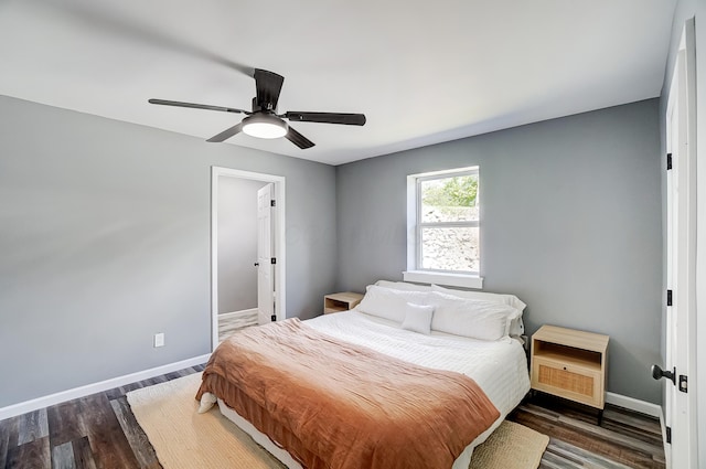 12323 Ringer Ln, Leesburg, OH 45135 - bedroom with baseboards, wood finished floors, and a ceiling fan