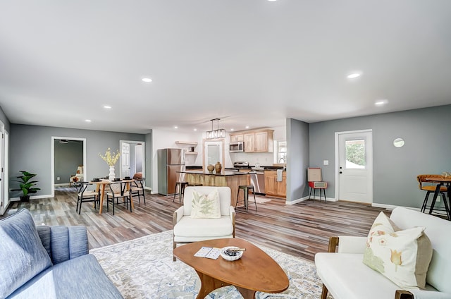 12323 Ringer Ln, Leesburg, OH 45135 - living room with recessed lighting, light wood-style floors, and baseboards