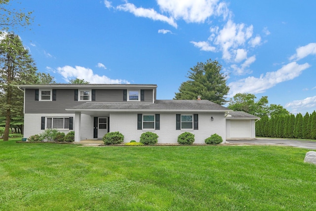 11831 Woodbridge Ln NW, Baltimore, OH 43105 - traditional-style home featuring driveway, a front lawn, and a garage