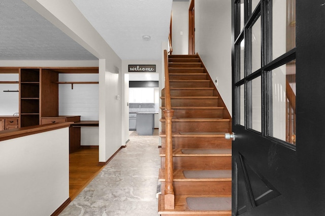 11831 Woodbridge Ln NW, Baltimore, OH 43105 - staircase with baseboards