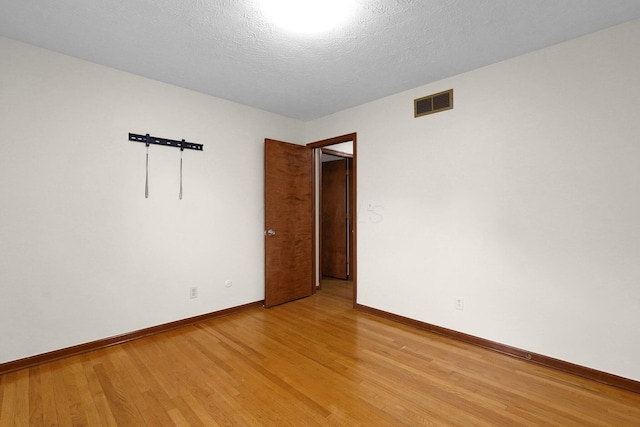 11831 Woodbridge Ln NW, Baltimore, OH 43105 - unfurnished room featuring light wood-type flooring and baseboards