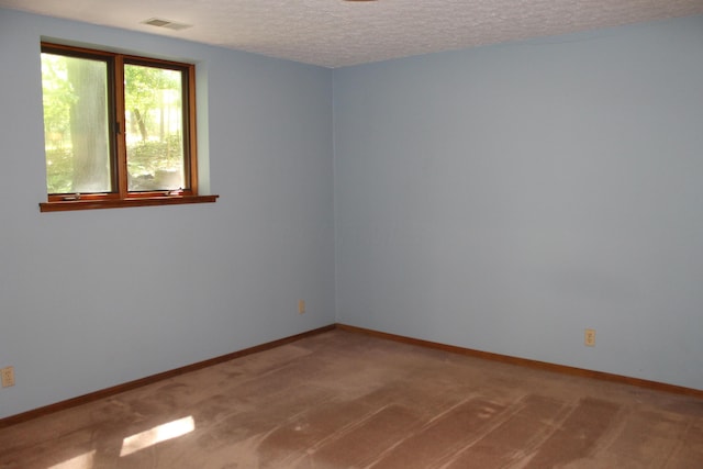 387 Mohican Ln, Sugar Grove, OH 43155 - unfurnished room featuring a textured ceiling, baseboards, and light carpet