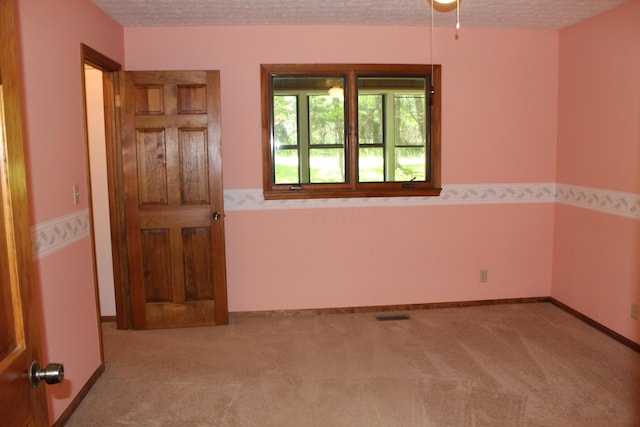 387 Mohican Ln, Sugar Grove, OH 43155 - spare room with carpet flooring and a textured ceiling
