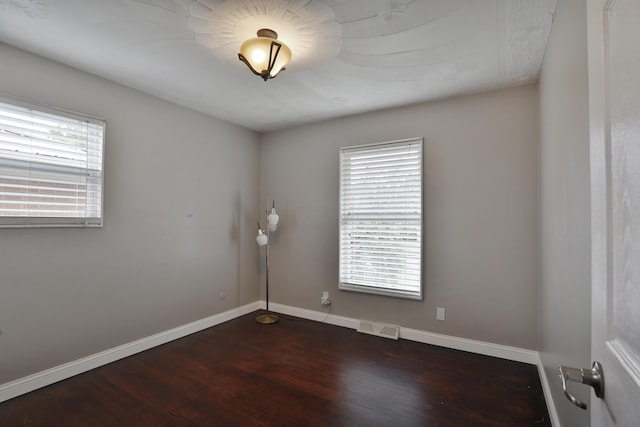 6219 Ambleside Dr, Columbus, OH 43229 - unfurnished room featuring dark wood-type flooring and baseboards
