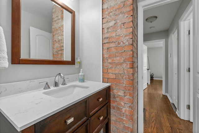 690 Reinhard Ave, Columbus, OH 43206 - bathroom featuring wood finished floors and vanity