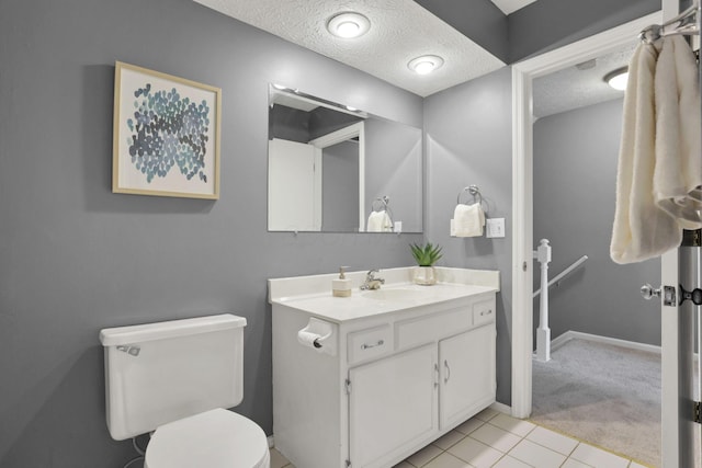 1755 Connors Point Dr, Columbus, OH 43220 - bathroom featuring vanity, a textured ceiling, toilet, baseboards, and tile patterned floors