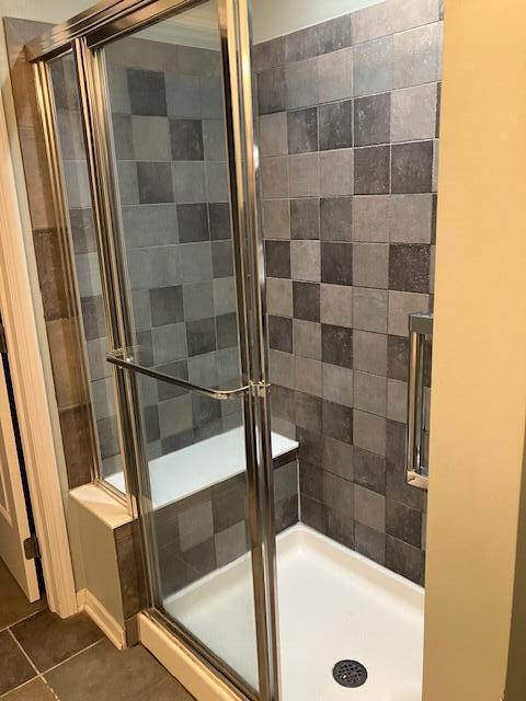 7343 Reynolds Crossing Dr, Reynoldsburg, OH 43068 - full bathroom with a shower stall and tile patterned floors