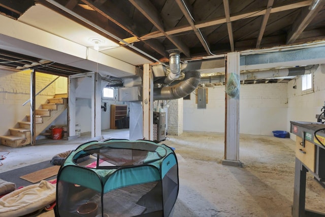 207 Jefferson Rd, Newark, OH 43055 - basement featuring electric panel, stairway, and healthy amount of natural light