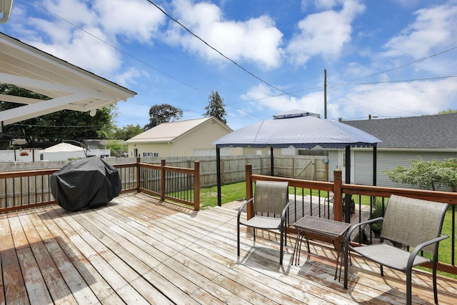 207 Jefferson Rd, Newark, OH 43055 - wooden terrace featuring grilling area and a fenced backyard