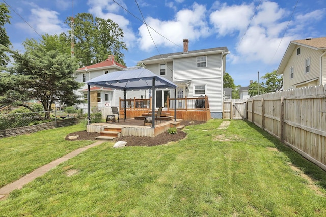 207 Jefferson Rd, Newark, OH 43055 - rear view of property with a gazebo, a deck, and a chimney