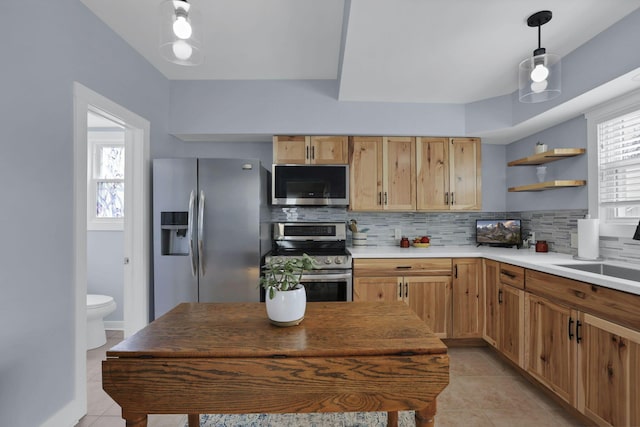 207 Jefferson Rd, Newark, OH 43055 - kitchen with stainless steel appliances, light tile patterned floors, backsplash, a sink, and open shelves