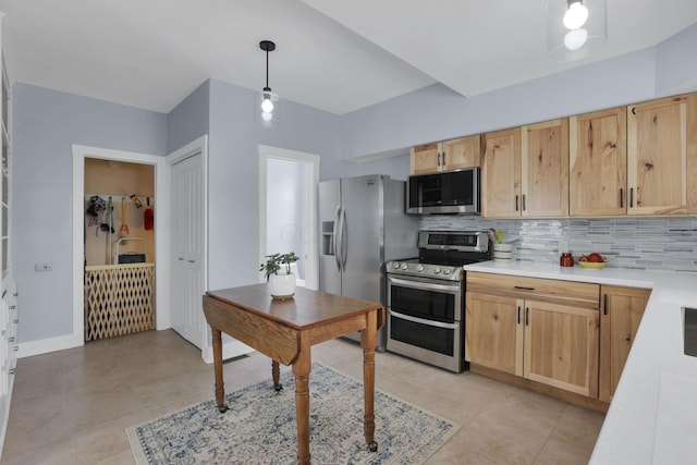 207 Jefferson Rd, Newark, OH 43055 - kitchen featuring stainless steel appliances, light brown cabinets, decorative backsplash, light countertops, and light tile patterned floors