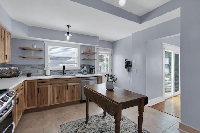 207 Jefferson Rd, Newark, OH 43055 - kitchen with stainless steel appliances, open shelves, a sink, backsplash, and light tile patterned floors