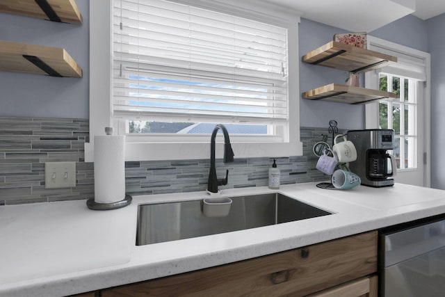 207 Jefferson Rd, Newark, OH 43055 - kitchen with open shelves, backsplash, light countertops, and plenty of natural light