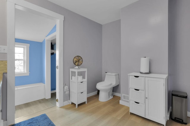207 Jefferson Rd, Newark, OH 43055 - bathroom with toilet, wood finished floors, and baseboards