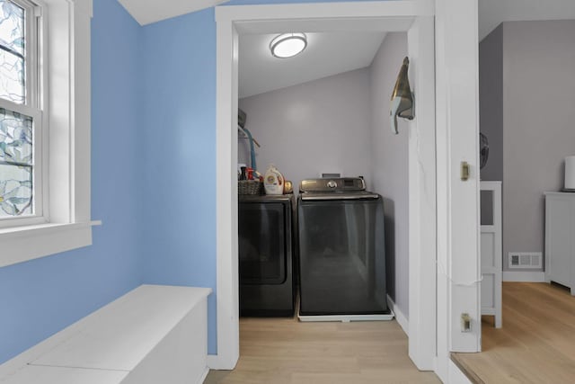 207 Jefferson Rd, Newark, OH 43055 - laundry room featuring washer and clothes dryer, light wood-type flooring, and baseboards
