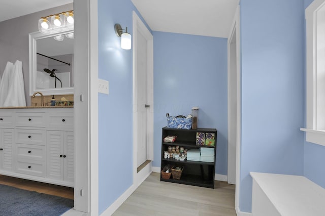 207 Jefferson Rd, Newark, OH 43055 - corridor with light wood-style floors, baseboards, and a sink