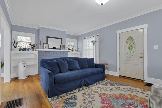 207 Jefferson Rd, Newark, OH 43055 - living area featuring wood finished floors, ornamental molding, and baseboards