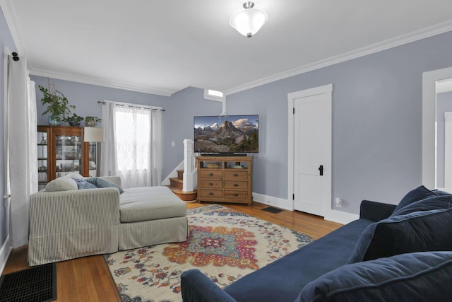 207 Jefferson Rd, Newark, OH 43055 - living area featuring ornamental molding, wood finished floors, and baseboards