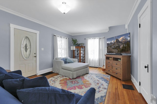 207 Jefferson Rd, Newark, OH 43055 - living room with ornamental molding, wood finished floors, and baseboards